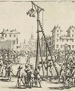 Utilização da strappado segundo uma gravura de Jacques Callot de 1633.