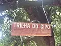 Placa rústica da Trilha.