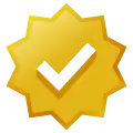 Gold-colored eight-lobed badge with checkmark icon.