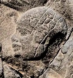 Usancuru, o filho cativo de Taraca, conforme retratado pelos assírios na estela da vitória de Assaradão