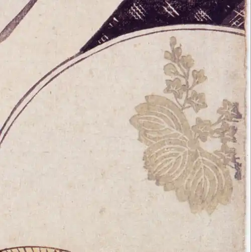 Close-up of a leafy crest on a hand fan