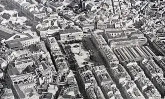 Fotografia aérea de 1919. São visíveis os telhados do Mercado no centro da Praça da Figueira