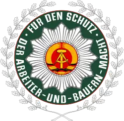 Emblema da antiga Polícia Popular Alemã.