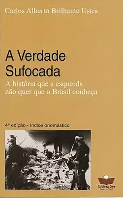 Capa do livro. A cor da capa é bege e há uma fotografia que mostra ruínas, provavelmente resultado de um ataque terrorista.