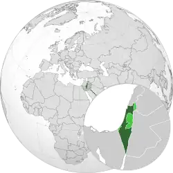 Localização de Israel (em verde) e dos territórios ocupados por Israel (em verde claro) no globo.