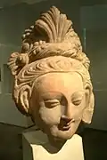 Busto de uma mulher serindiana Bodisatva, terracota, Tumixuque (Xinjiang) século VI-VII.