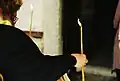 Woman with Candle at Monastery of Saint Johns during Easter Celebrations