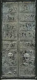 Portas de Bernward (c. 1015). Ápice da fundição em bronze pela técnica da cera perdida.