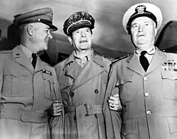 Three men in neat uniforms smiling. MacArthur is wearing his distinctive cap and no tie.