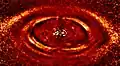 Anéis concêntricos ao redor da jovem estrela HD 141569A, localizada a cerca de 370 anos-luz de distância.[12]