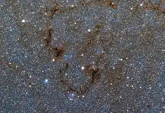 Uma pequena porção de um mosaico colorido de gigapixels do coração da Via Láctea[51]