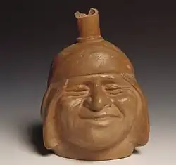 Vaso-retrato sorridente mochica.