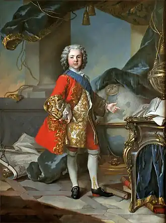 Luís, Delfim da França aos 9 anos, por Louis Tocqué, 1738. O delfim é retratado estudando, com um globo e tratado de fortificação.