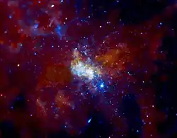 O centro da galáxia, onde se localiza um buraco negro supermassivo.