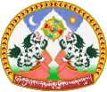 Escudo da Administração Central do Tibete com darmachacra em estilo budista tibetano.