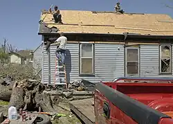 Well-built structures are typically unscathed, though sometimes sustaining broken windows, with minor damage to roofs and chimneys. Billboards and large signs can be knocked down. Trees may have large branches broken off and can be uprooted if they have shallow roots.