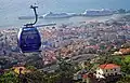 O teleférico do Monte com o Funchal ao fundo