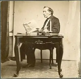 H. C. Andersen lendo o jornal Fædrelandet.