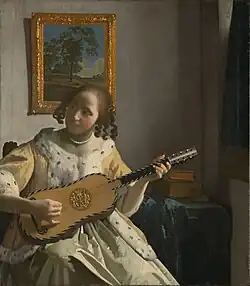 Pintura mostrando uma guitarra barroca (1670)