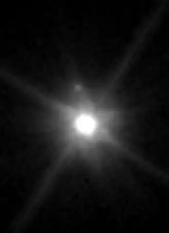 Makemake pelo telescópio Hubble