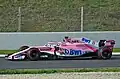 Sergio Pérez testando o modelo VJM11 em Catalunha em 2018.