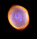 A Nebulosa Espirógrafo, morfologia esferoidal. Três cores são diferenciadas, correspondentes a nitrogênio ionizado, hidrogênio, e oxigênio ionizado, de fora para dentro.